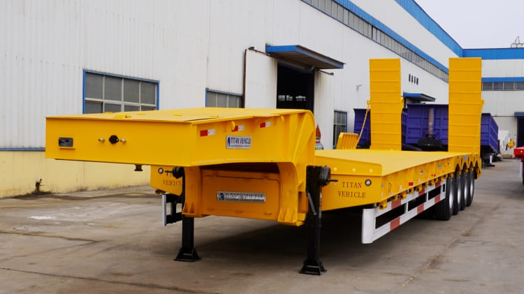 3.Advantages of low bed semi trailer ●The main beam of the low bed trailer is made of HG60 high-strength structural steel. Its yield strength is ≥ 620Mpa,We used submerged arc welding technology ,it has a higher carry capacity and to make the beam more solid . ● The lowbed main beam adopts a height of 550mm and a thickness of 14mm. The thickness of the upper plate and lower plate both are 22mm, and the width of the upper and lower plates is 220mm.Side support’s thickness is 6mm, the distance of the side support is only 450mm. ● The side beam adopts
